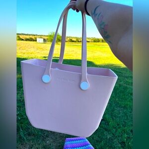Versa tote pink rubber tote bag